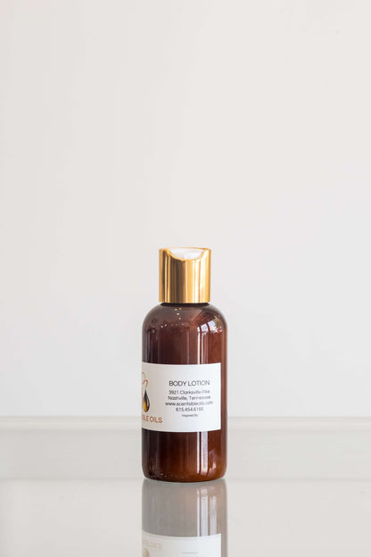 Exclusive Lotion in a brown bottle with a gold cap, perfect for hydrating and nourishing skin.
